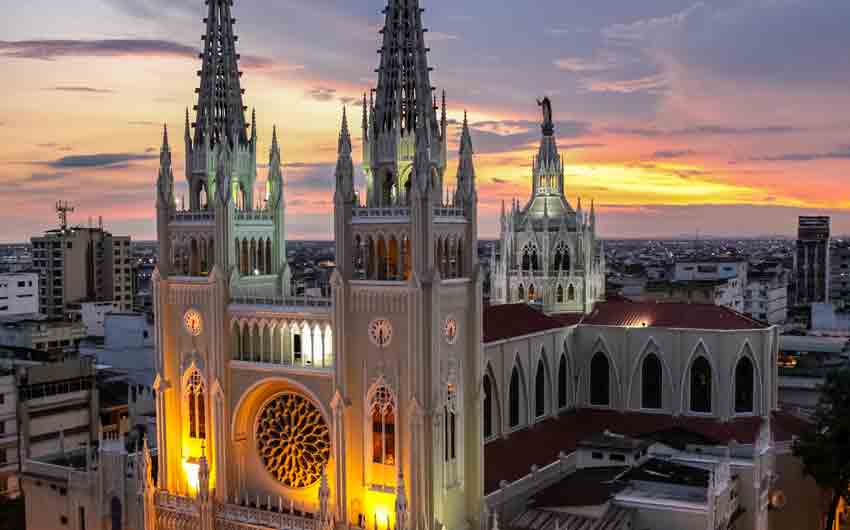 Scenic sunset sky with illuminated Guayaquil Metropolitan Cathedral