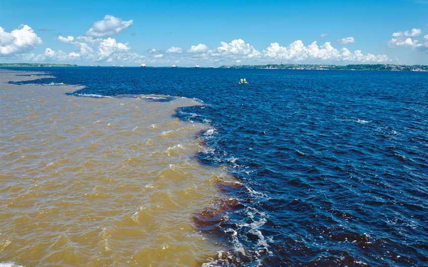 The Black River (Rio Negro) and Amazon River (Rio Amazonas) meet each other near Manaus City