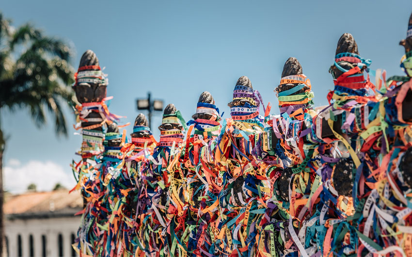 Fence of colorful ribbons at Bomfim church in Salvador
